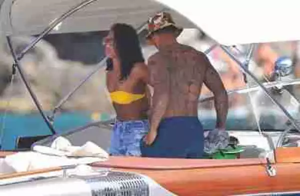 Footballer Memphis Depay Flaunts His Huge Tattoo As He Cruise With His Fiancee On Boat (Pics)